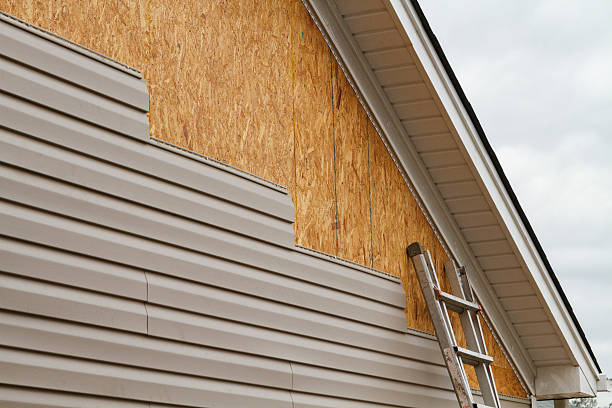 Professional Siding Replacement technician working in North Wales, PA